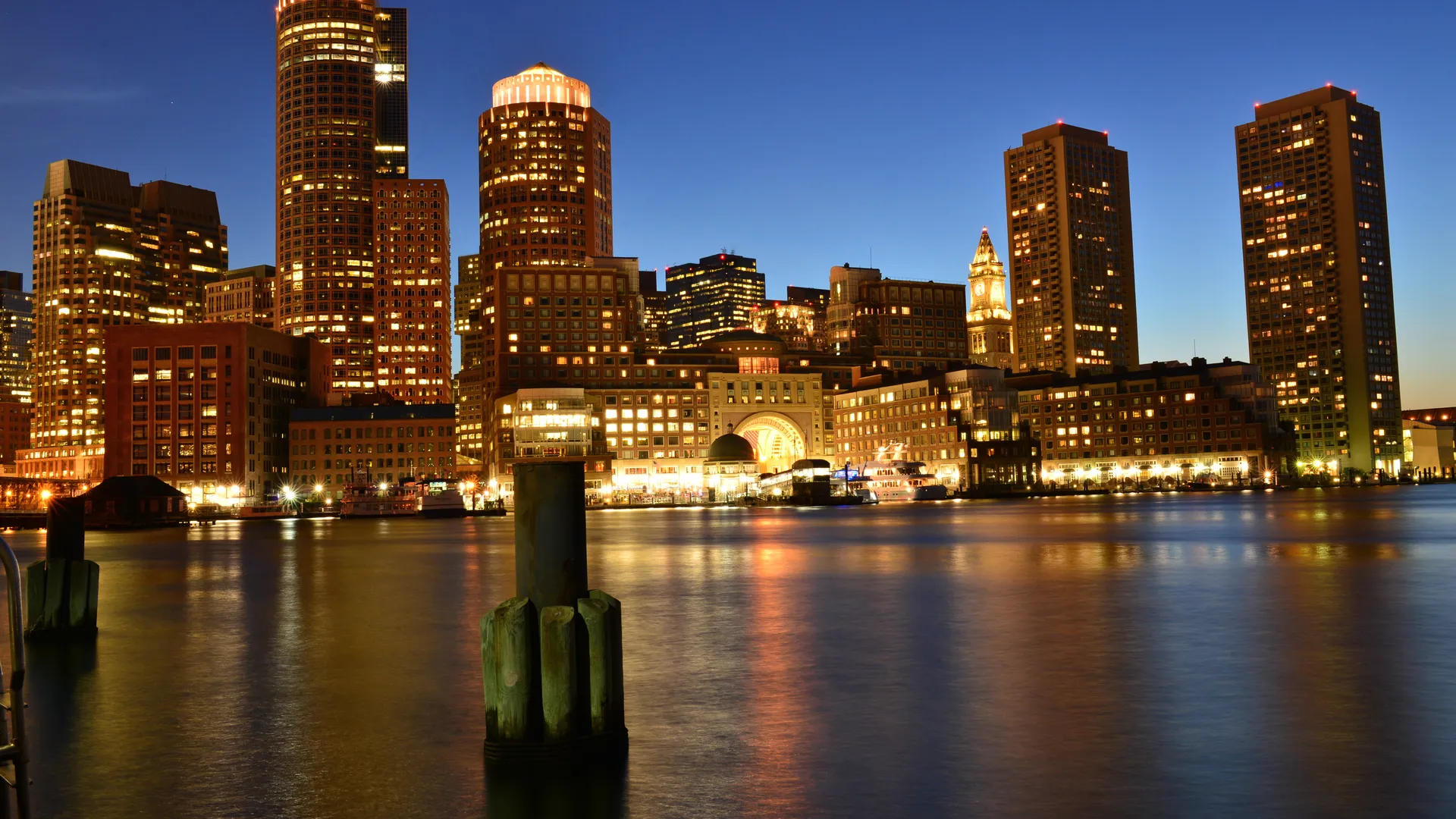Boston skyline at dusk for a sports travel guide