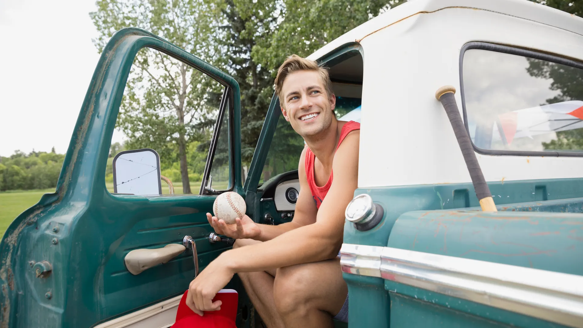 Baseball road trip scene with a vintage truck and gear for a Midwest MLB travel guide.
