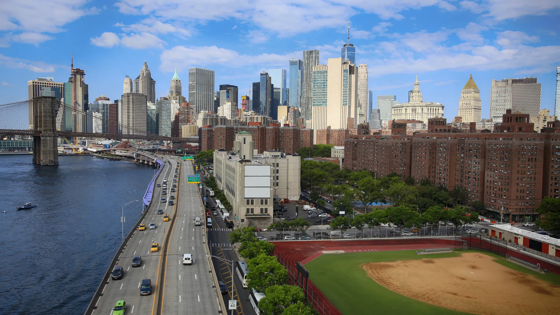 Manhattan skyline and Brooklyn Bridge for a New York City sports travel guide
