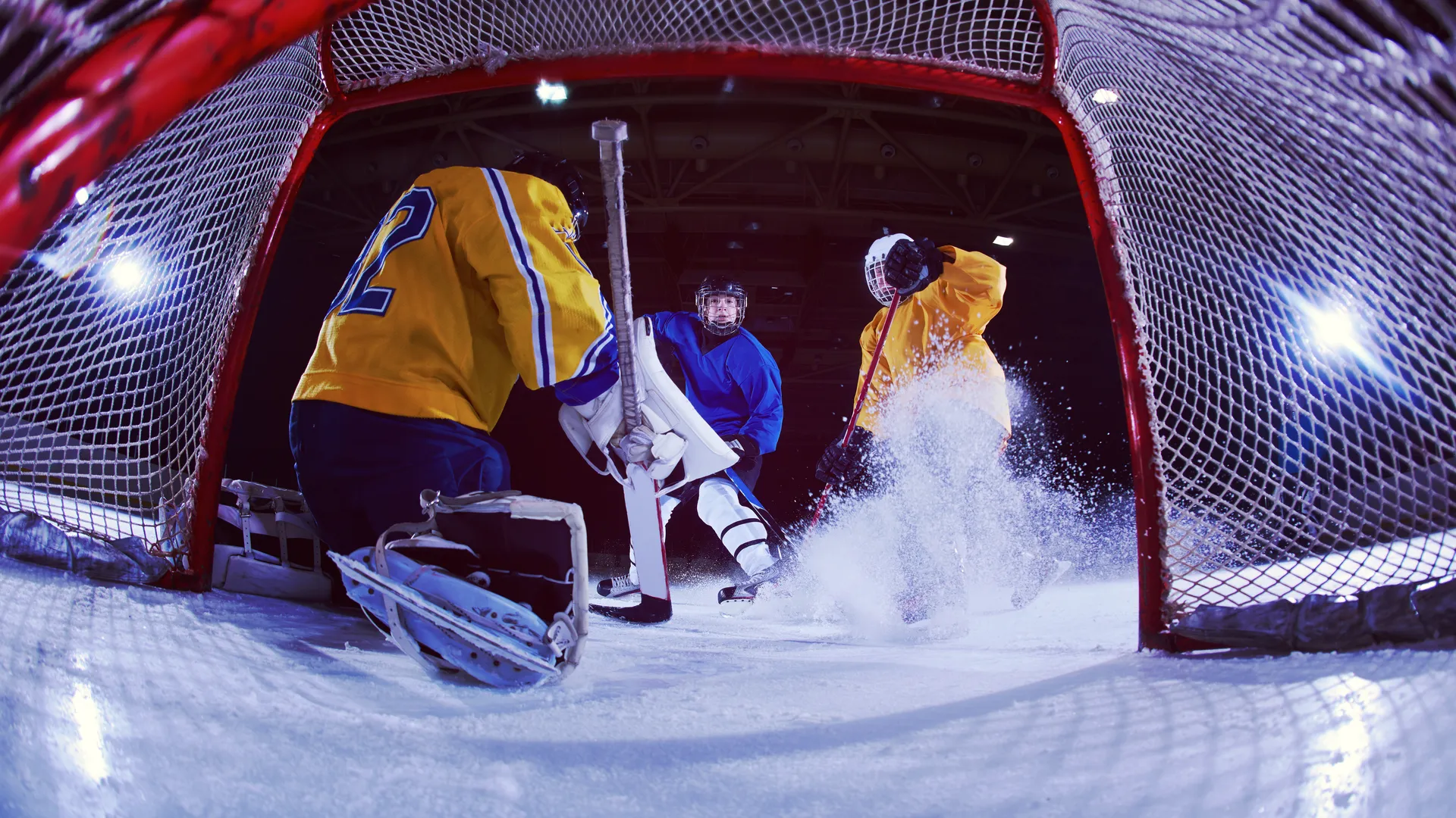 Intense ice hockey match inside an indoor arena
