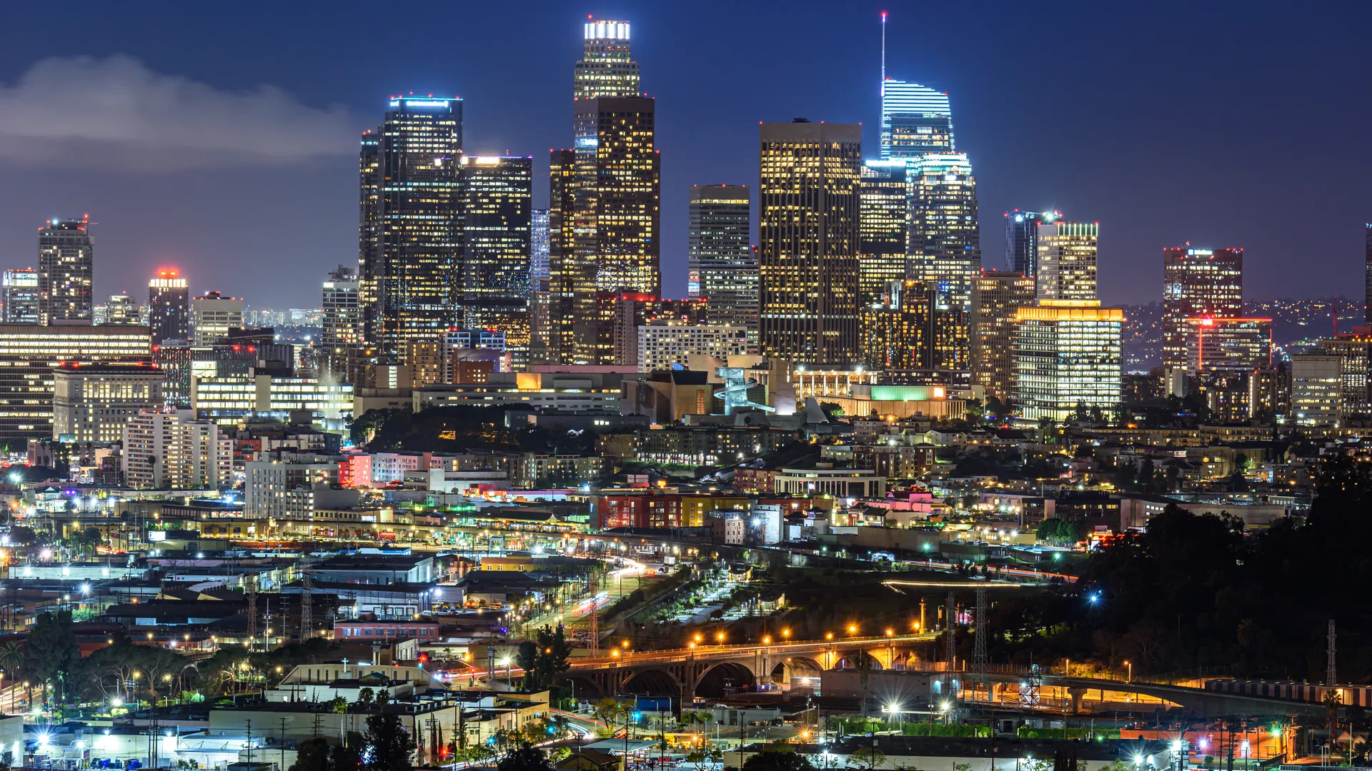 Downtown Los Angeles skyline at night for a Super Bowl LVI lookback article