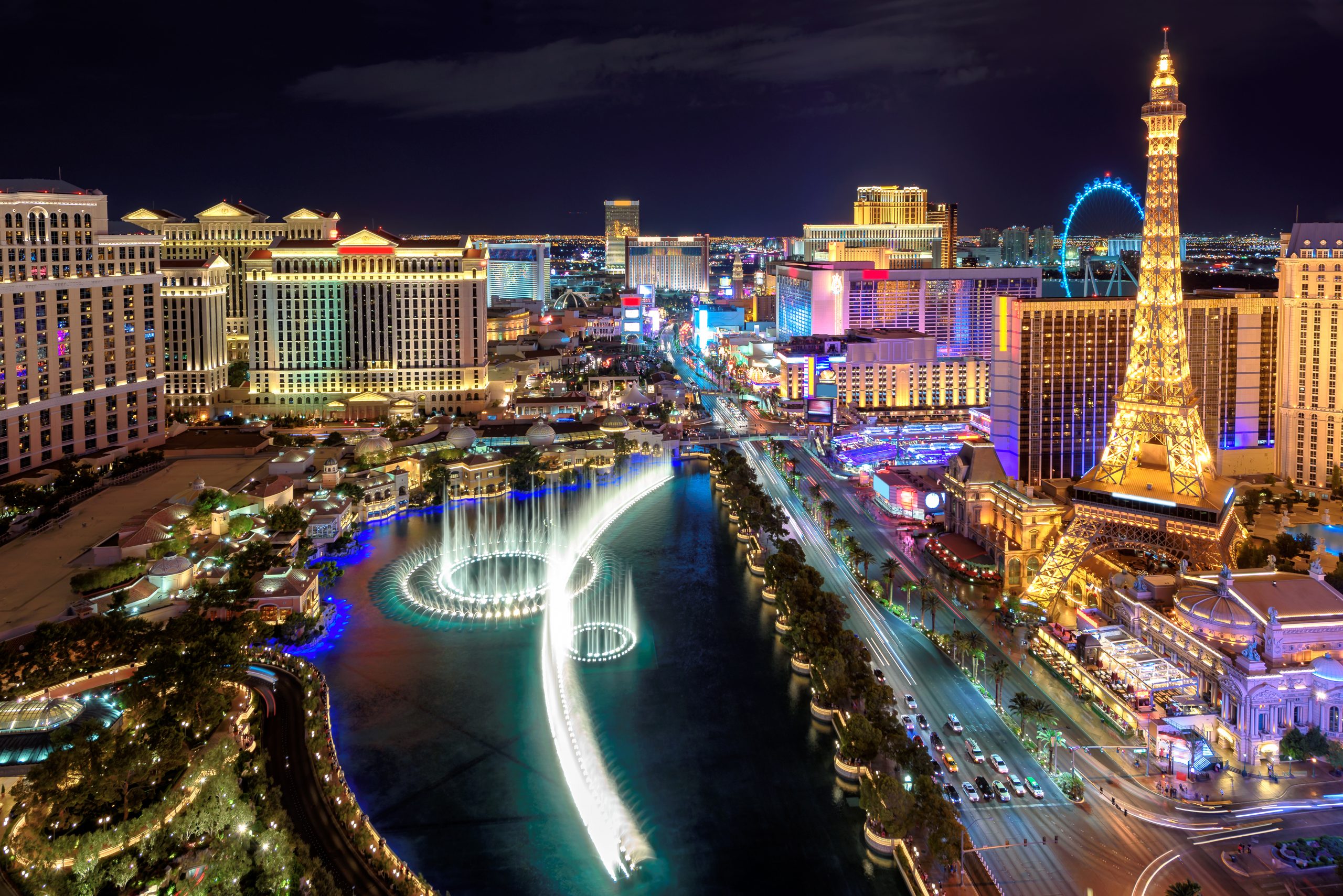 Aerial view of the Las Vegas Strip at dusk showing the resort corridor that fans navigate on game day.